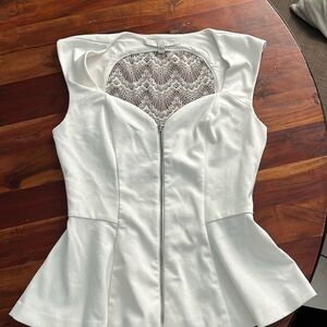 Guess Peplum Top with zipper, lace on the back size M (stretch material).